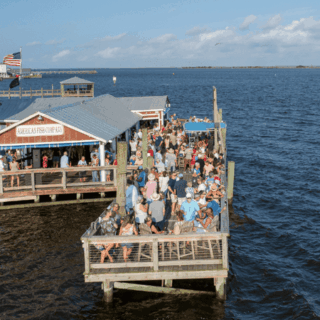 This Laid-Back North Carolina Waterfront Hangout Serves Up Sunset Views, Live Music, and Drinks Right Over the Water