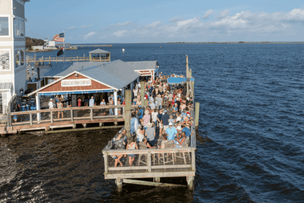 This Laid-Back North Carolina Waterfront Hangout Serves Up Sunset Views, Live Music, and Drinks Right Over the Water