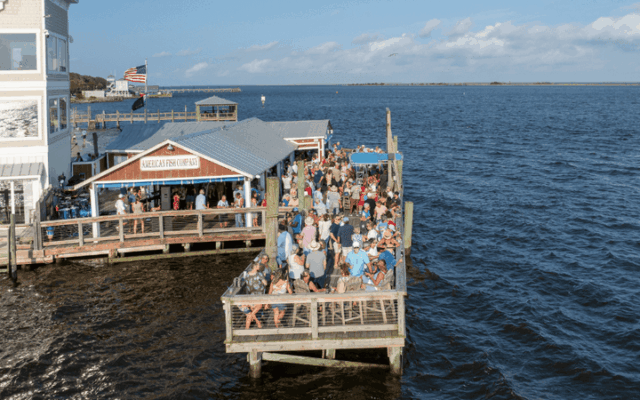 This Laid-Back North Carolina Waterfront Hangout Serves Up Sunset Views, Live Music, and Drinks Right Over the Water