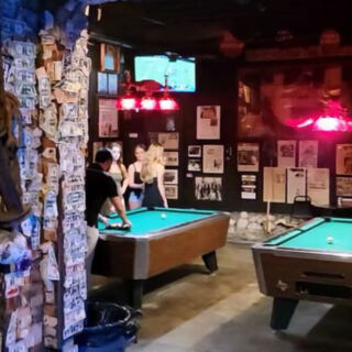 This Historic Florida Bar Was Once A Morgue And Has A Tree Growing Inside