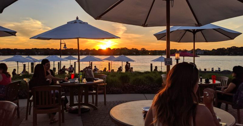This Michigan Waterfront Restaurant Is Famous for Sunset Views So Stunning You’ll Forget Your Food