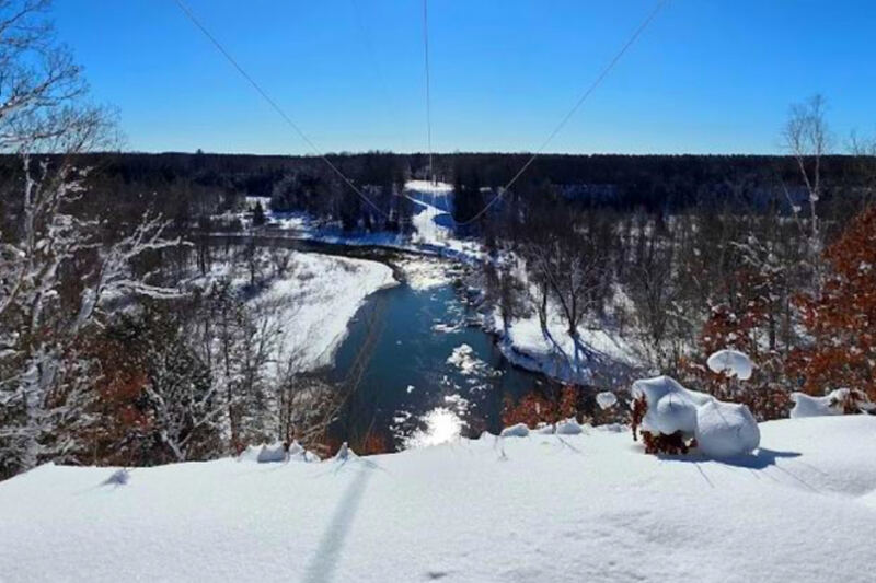 A 96-Foot-High Railroad Bridge Once Towered Over This Hidden Michigan River Site