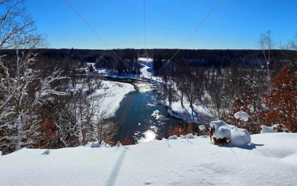 A 96-Foot-High Railroad Bridge Once Towered Over This Hidden Michigan River Site