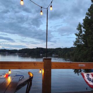 This Laid-Back North Carolina Lakeside Grill Serves Live Music, Cold Drinks, And Boats Drifting By The Deck