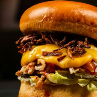 This Illinois Burger Joint Grinds Bacon Directly Into Every Patty With Its Unusual 90/10 Beef Blend