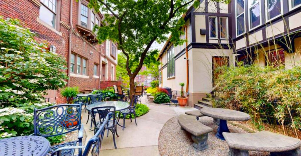 Most People Drive Right Past This Detroit Mansion – Inside, There’s a Speakeasy, Fireplaces, and a Stay You Won’t Forget