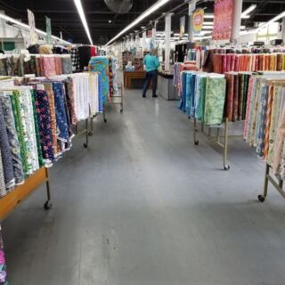 This Old Massachusetts Mill Building Hides Shelves of Rare Fabrics, Hand-Dyed Wool, and Imported Prints