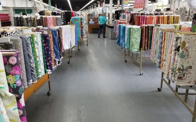 This Old Massachusetts Mill Building Hides Shelves of Rare Fabrics, Hand-Dyed Wool, and Imported Prints
