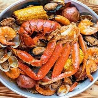 This South Carolina Seafood Spot Loads Its Cajun Boils and Appetizer Fries with Crab Meat