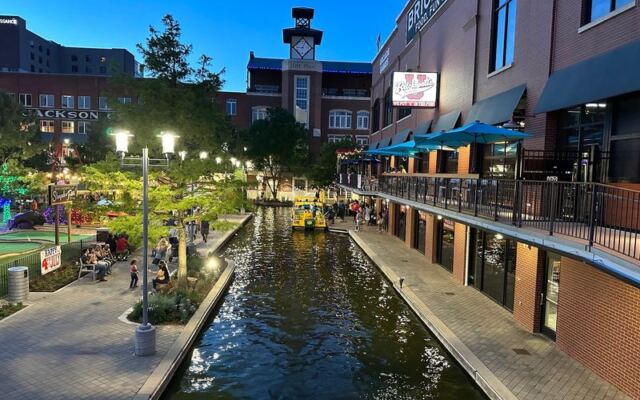 This Old Oklahoma City Warehouse District Became a Canal-Lined Riverwalk Locals Brag About