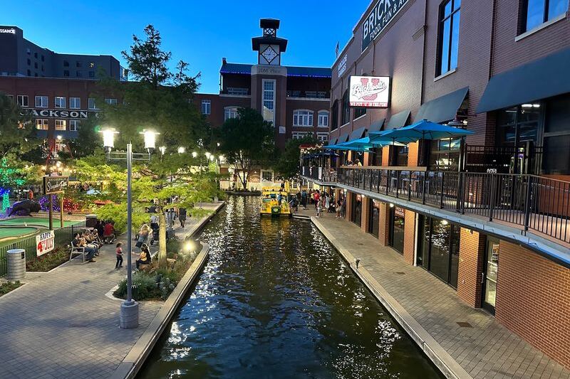 This Old Oklahoma City Warehouse District Became a Canal-Lined Riverwalk Locals Brag About