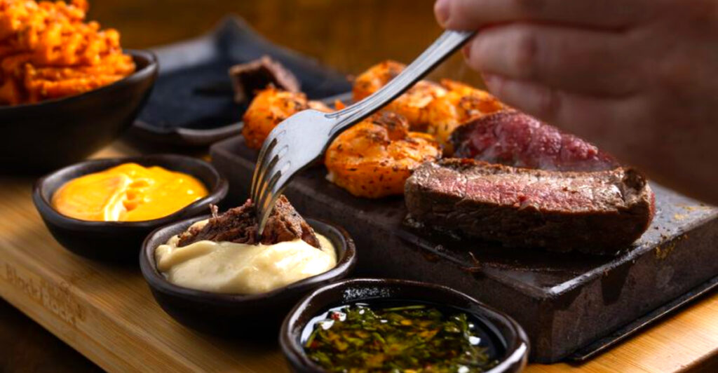 This Pittsburgh Tavern Serves Steak on an 800-Degree Stone and Lets You Cook Every Bite Yourself