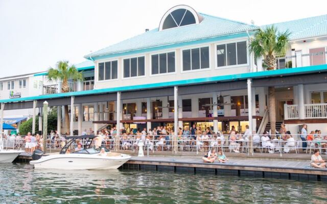 This North Carolina Marina Grill Serves Up Fresh Seafood, Live Music, and a Patio Right on the Water