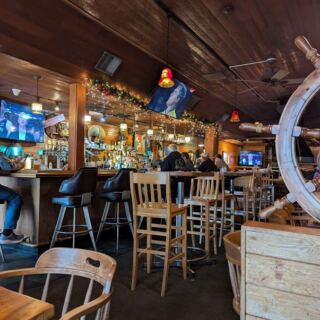 This Oregon Coast Seafood Joint Fills Up at Night for Its Live Music, Old-School Charm, and Buttery Clam Chowder