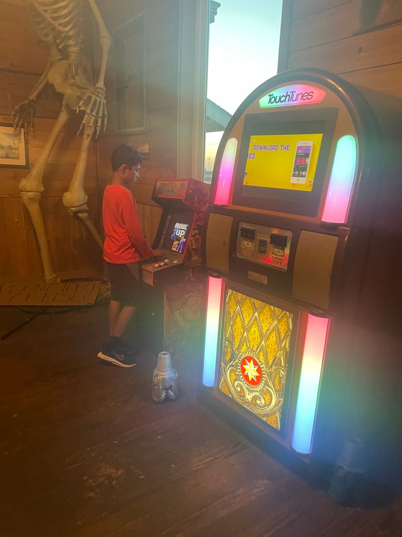 A Country Atmosphere With TVs, Jukebox, And Arcade Games