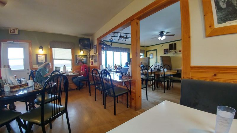 A Cozy Little Spot With Twelve Tables