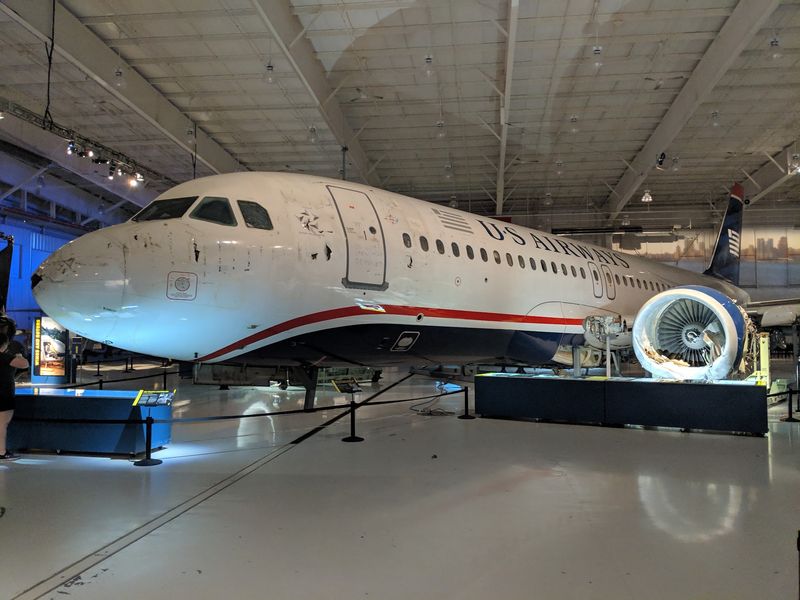 A Hangar Tucked Beside a Busy Runway