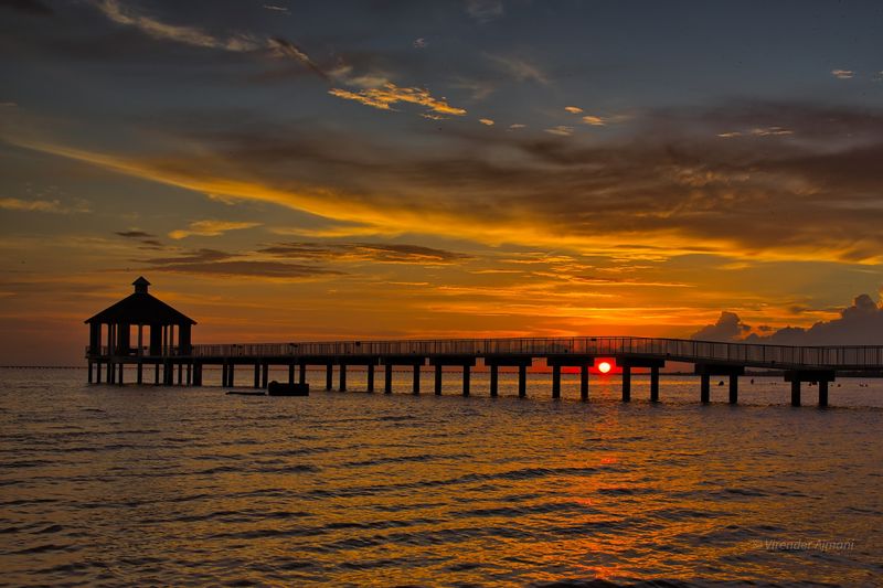A Long Pier Reaching Over the Water