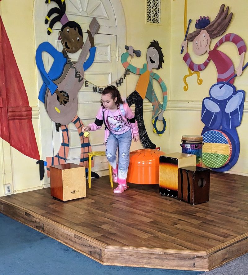 A Music Room Stage Loaded With Instruments and Lights A Music Room Stage Loaded With Instruments and Lights