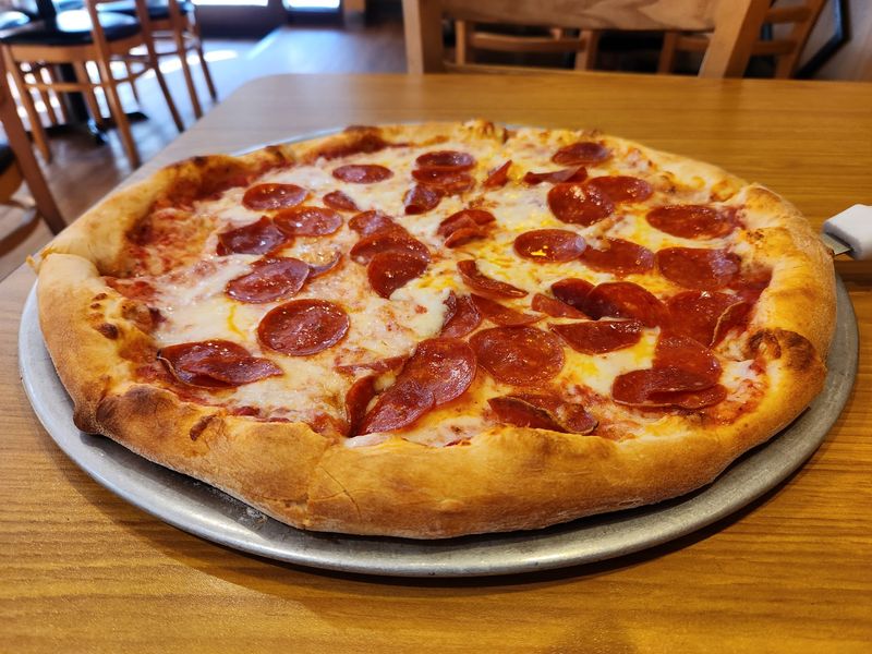 A Pizza Sauce That Fans Drive Across the City to Taste