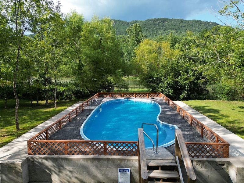 A Pool And Hot Tub With A View