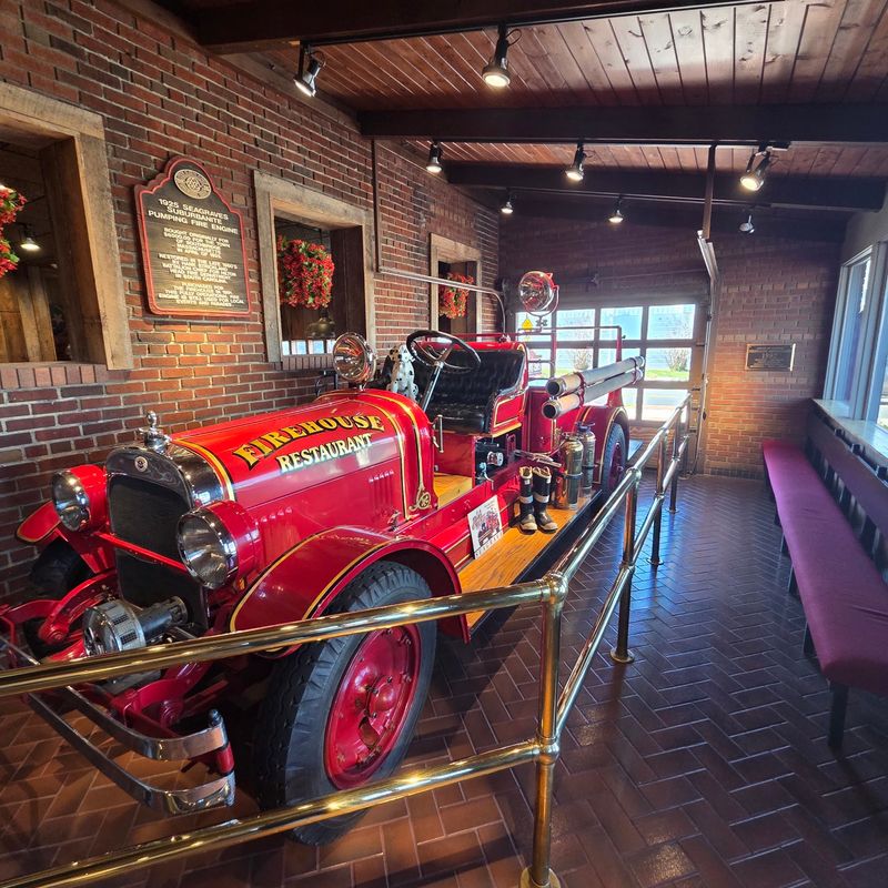 A Vintage Pumper Engine Parked Indoors A Vintage Pumper Engine Parked Indoors