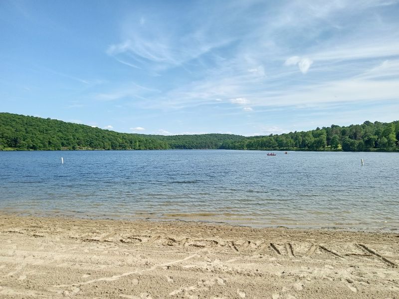 A Wooded Retreat Wrapped Around a Scenic Lake A Wooded Retreat Wrapped Around a Scenic Lake