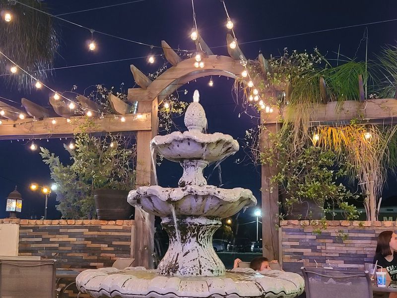 An Outdoor Patio With a Fountain
