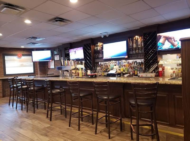 Bar Up Front, Dining Room in Back Bar Up Front, Dining Room in Back