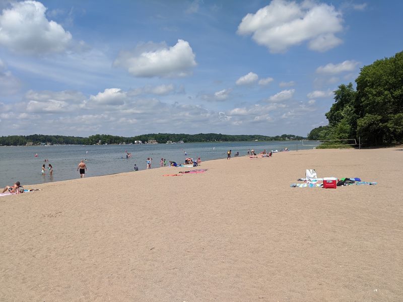 Clear Water and Soft Sand at the Swimming Beach Clear Water and Soft Sand at the Swimming Beach