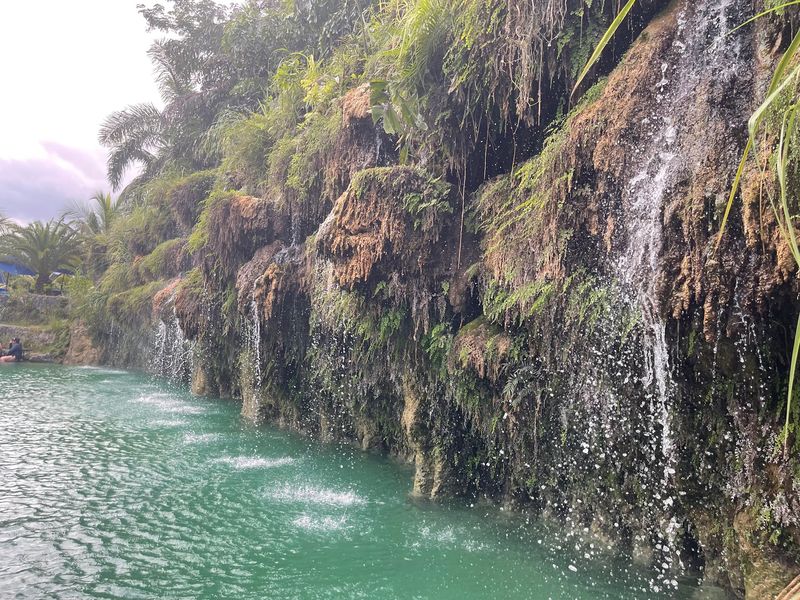 Crystal Water and Cascading Rock Walls Crystal Water and Cascading Rock Walls