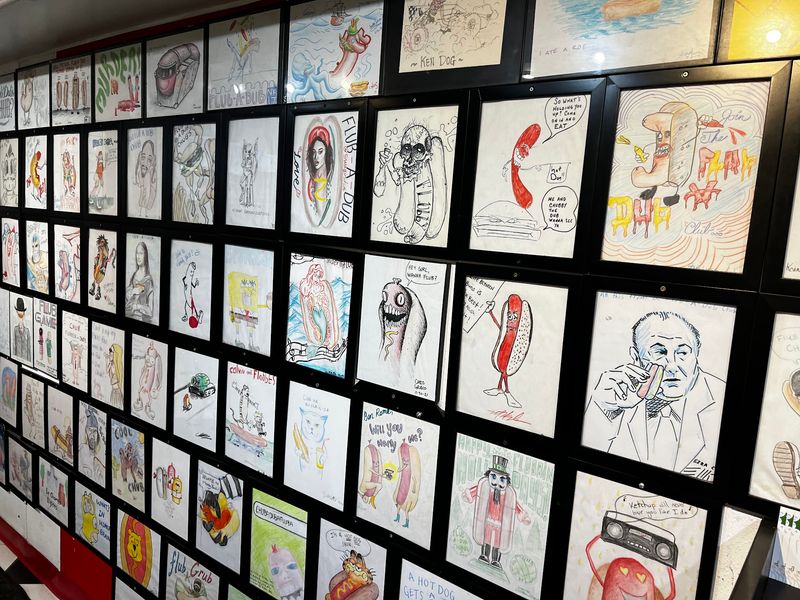 Customer-Drawn Hot Dog Art Covering Every Wall Customer-Drawn Hot Dog Art Covering Every Wall