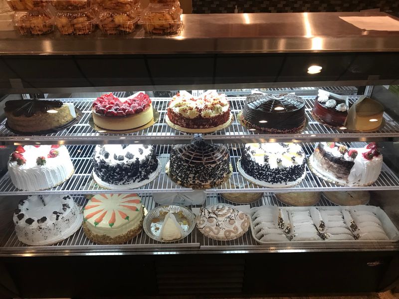 Desserts and the Bakery Case by the Register Desserts and the Bakery Case by the Register