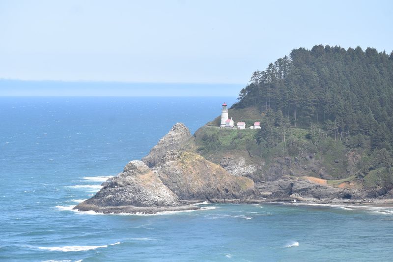 Heceta Head Lighthouse Glowing Across the Water