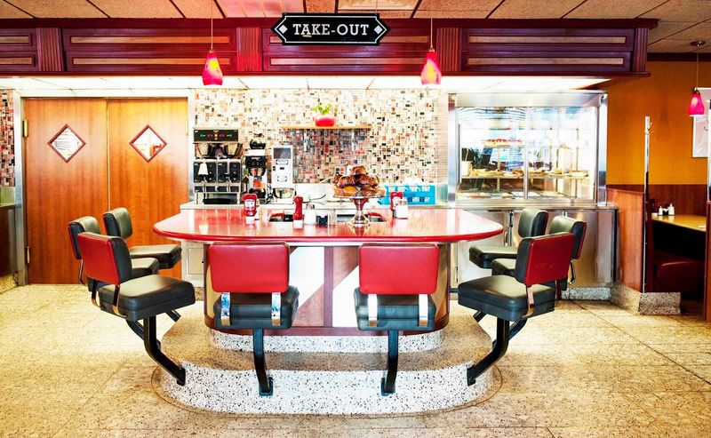 Inside: Burgundy Booths, Swivel Stools, and Pure Nostalgia Inside: Burgundy Booths, Swivel Stools, and Pure Nostalgia