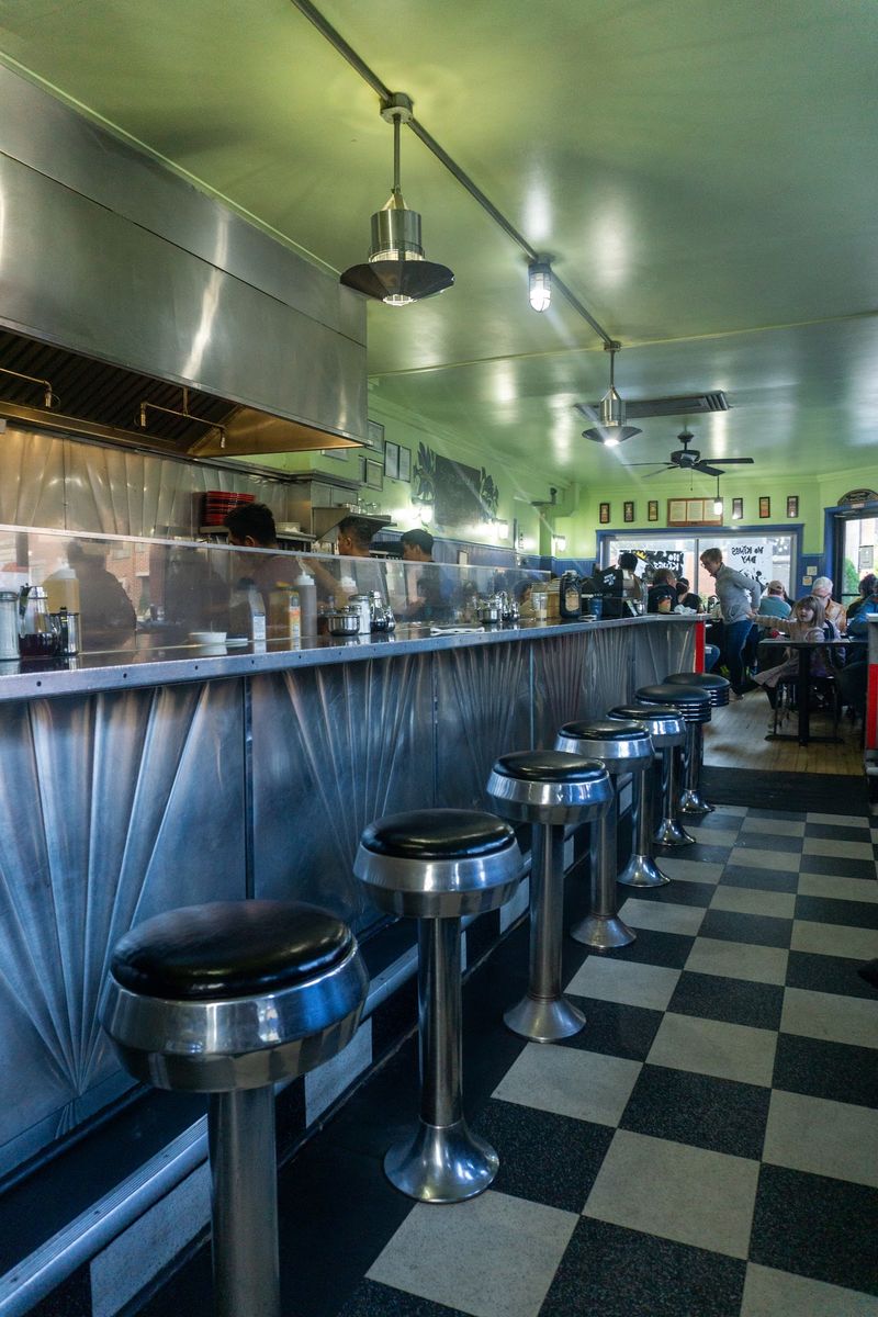 Inside the Diner: Checkered Floors and Mint Green Walls