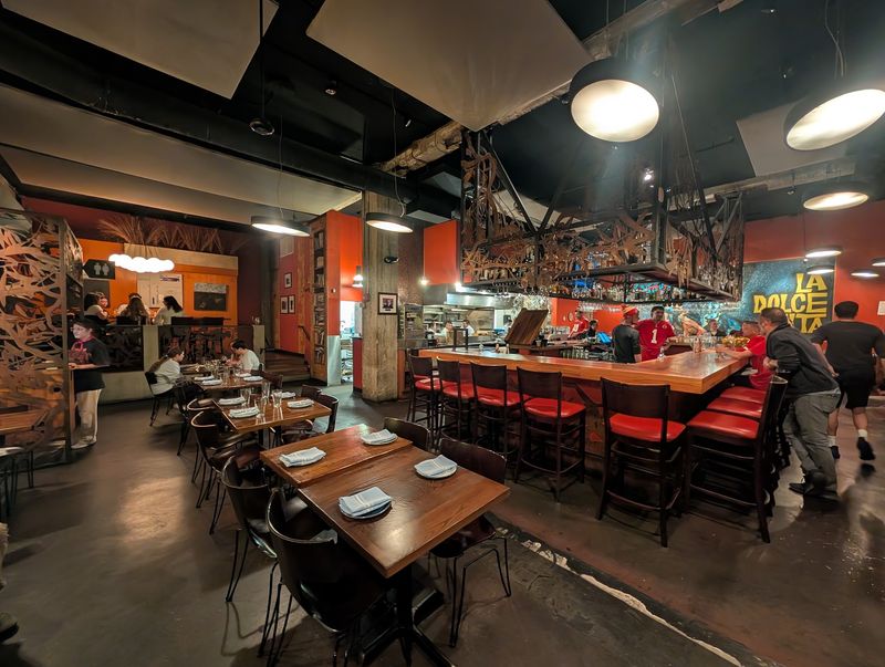 Inside the Restaurant: Color, Energy, and a Bar That Steals the Show