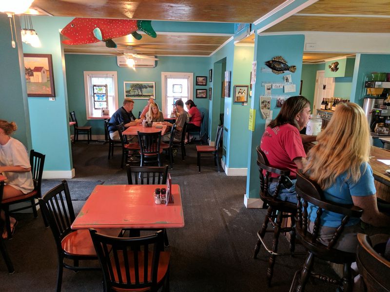 Local Art and a Quaint Cafe Feel Local Art and a Quaint Cafe Feel