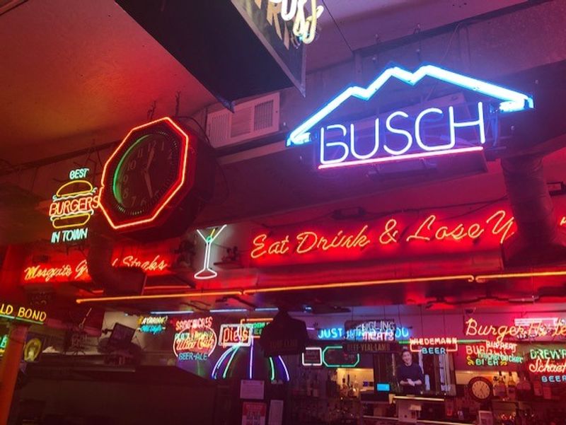 Neon Signs Covering Every Inch Of The Walls Neon Signs Covering Every Inch Of The Walls