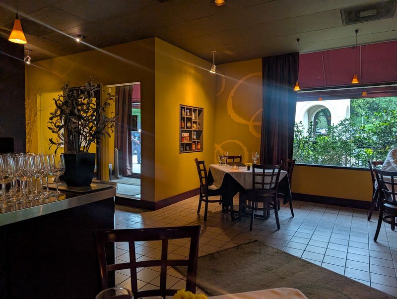 Only Five Tables Under Warm, Dim Light Only Five Tables Under Warm, Dim Light