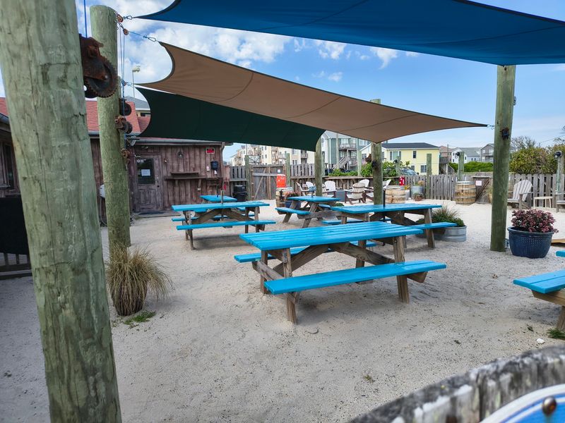 Outdoor Seating, Cornhole, and Sandy Toes Outdoor Seating, Cornhole, and Sandy Toes