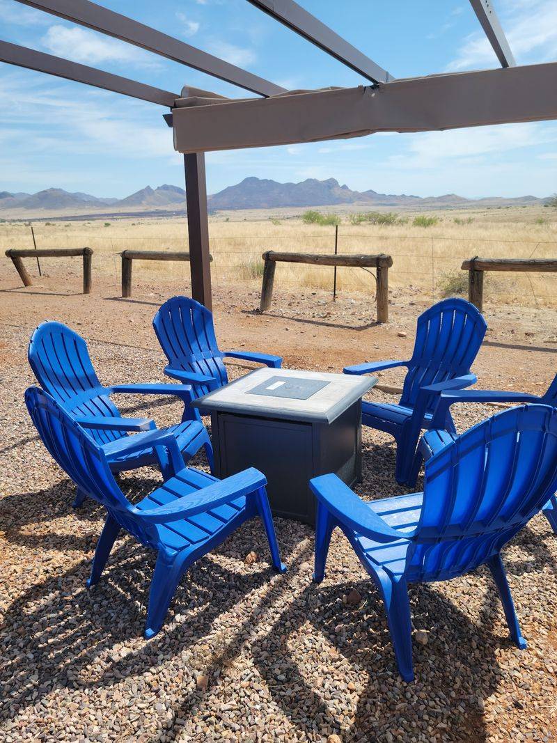 Patio Seats and a Grassy Lawn Patio Seats and a Grassy Lawn