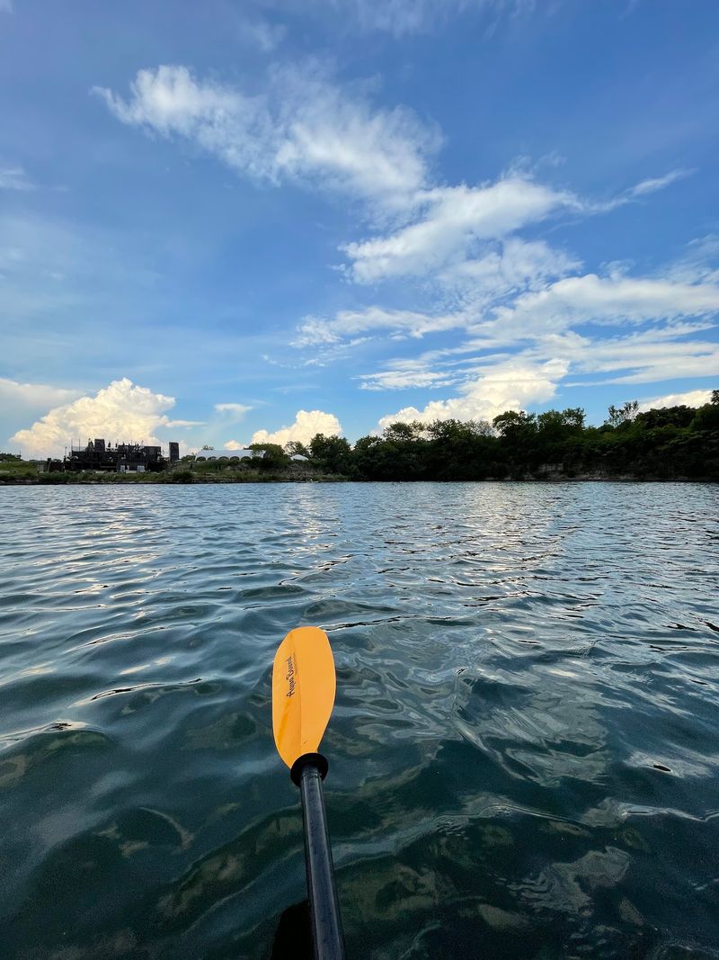 Peaceful Kayaking Across the Quarry Lake Peaceful Kayaking Across the Quarry Lake