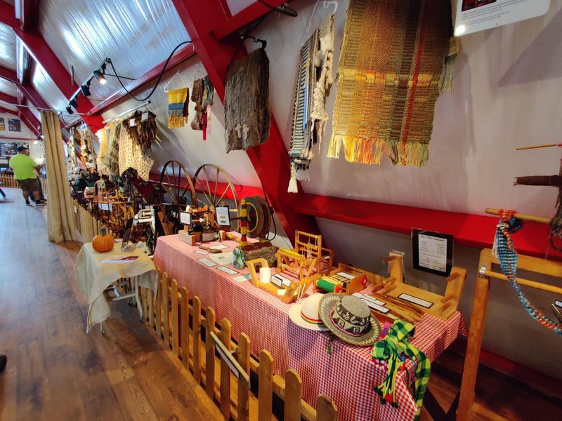 Rows of Handmade Quilts and the Barn Shop Experience Rows of Handmade Quilts and the Barn Shop Experience