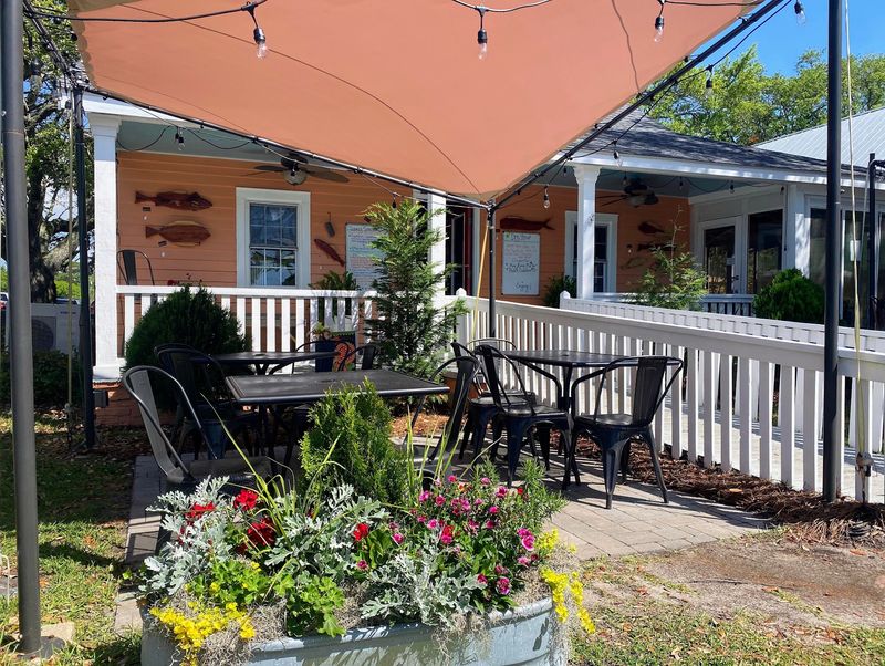 Sail Shades, Side Porches, and Gravel Yard Seating Sail Shades, Side Porches, and Gravel Yard Seating