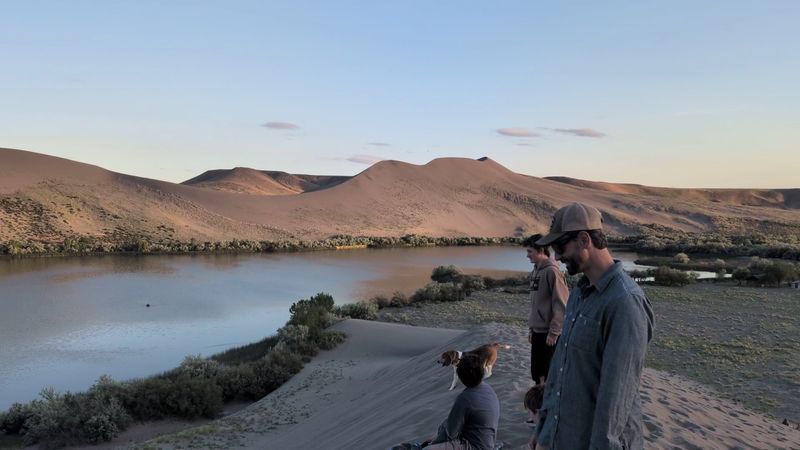 Sandboarding, Swimming, and Fishing at the Base