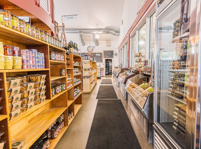 Shelves of Jams, Crackers, and Local Finds Shelves of Jams, Crackers, and Local Finds
