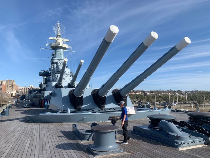 Standing Beside the Mighty Gun Turrets