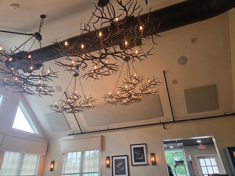 Stone Walls, Custom Chandeliers, and a Room That Rewards Attention Stone Walls, Custom Chandeliers, and a Room That Rewards Attention