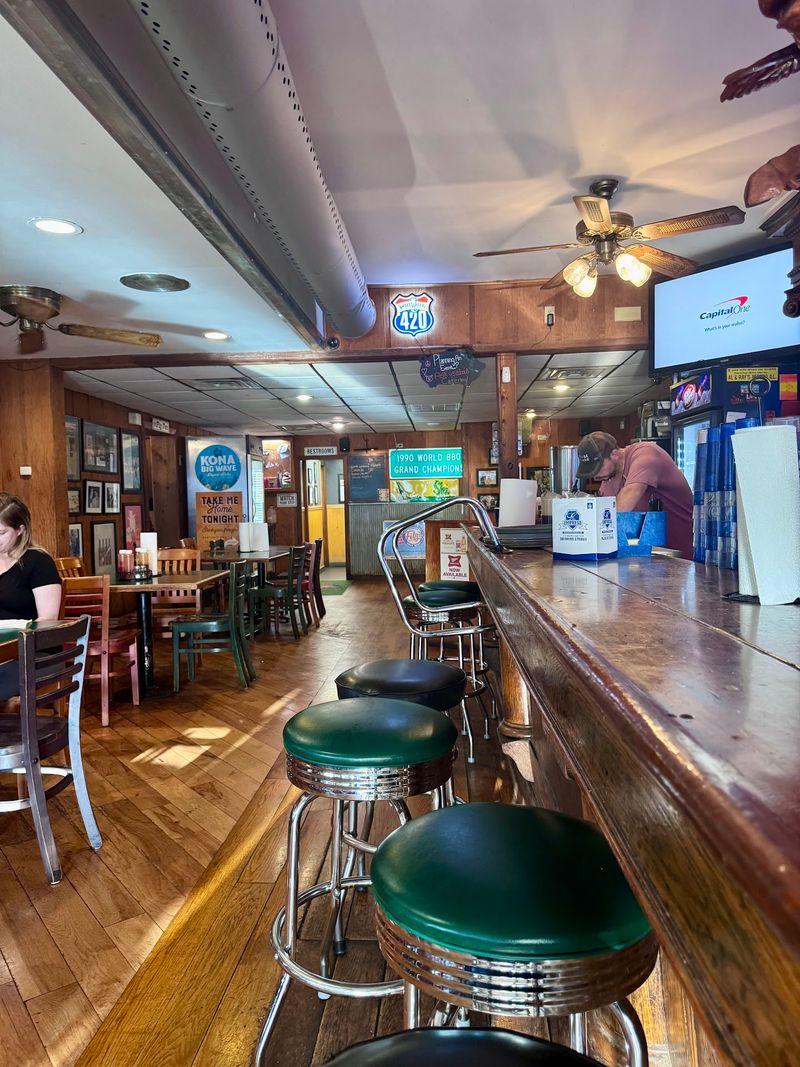The Atmosphere Inside: Wood Panels, BBQ Photos, and Real Character The Atmosphere Inside: Wood Panels, BBQ Photos, and Real Character